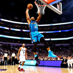 NBA 올스타전 화제 모먼트 - Vince Carter's Iconic Dunk**

"Vince Carter, mid-air, performing a gravity-defying dunk during the N...